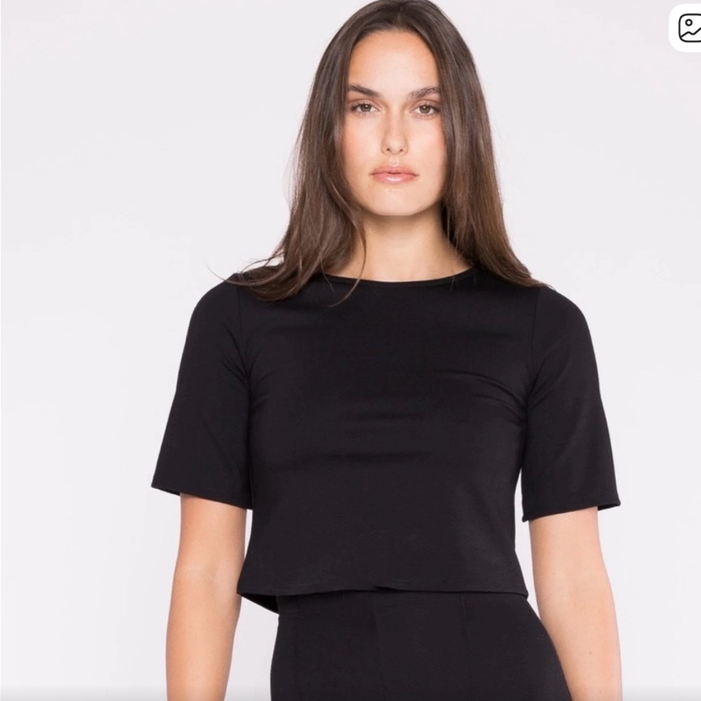 Ripley Rader Elegant Black Women's Top
New, never worn but without tags.